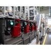 Picture of Harmony XB5, Head for illuminated push button, plastic, red projecting, 22mm, universal LED, spring return, plain lens