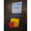 Picture of Control station, Harmony XALK, plastic, yellow lid, 1 red mushroom push button 40mm, turn to release, 1NC with monitoring, unmarked